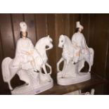 Pair of Staffordshire figures on horseback - one repaired Catalogue only, live bidding available via