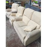 A three piece cream cloth suite including an electric reclining armchair Catalogue only, live