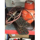 A Calor Gas burning bottle and torch together with a lifting cradle Catalogue only, live bidding