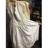 A wedding dress with long train Catalogue only, live bidding available via our website, if you
