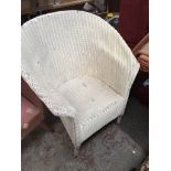 A white woven armchair Catalogue only, live bidding available via our website, if you require P&P