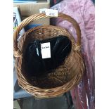 A wicker basket and a handbag Catalogue only, live bidding available via our website, if you require