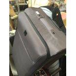 A Tripp wheelie soft shell travel suitcase. Catalogue only, live bidding available via our