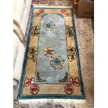 A Chinese style rug, 191cm x 92cm, Catalogue only, live bidding available via our website, if you re