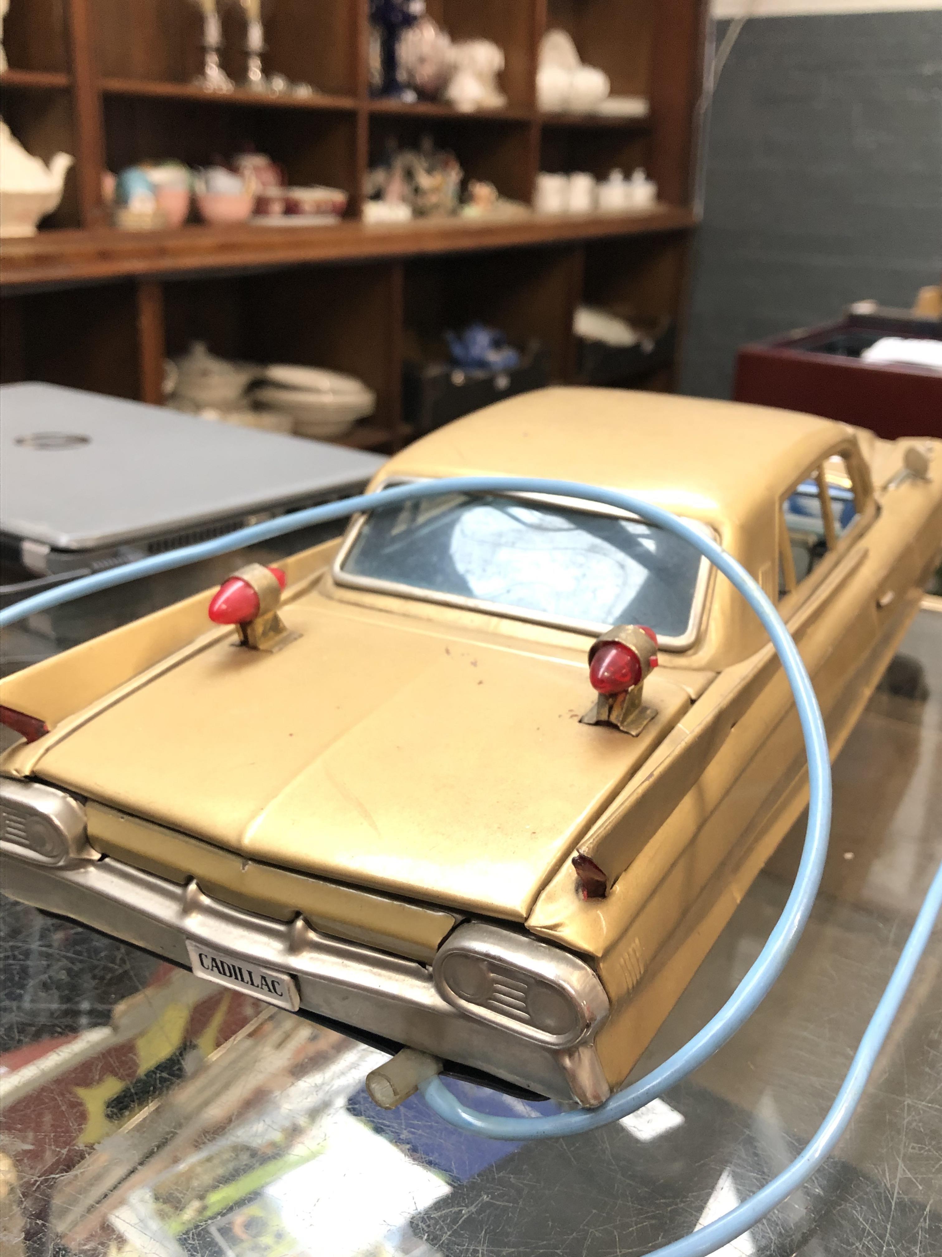 A vintage Bandai tin plate Cadillac with remote Catalogue only, live bidding available via our - Image 8 of 13