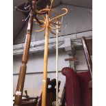A light wood coat stand Catalogue only, live bidding available via our website, if you require P&P
