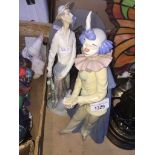 A Nao & a Lladro figures Catalogue only, live bidding available via our website, if you require P&