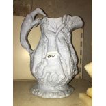 A 19th century relief moulded blue glaze hunting jug. Catalogue only, live bidding available via our