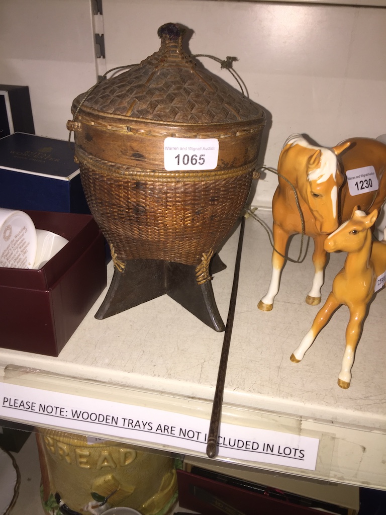 A Chinese wicker sewing basket and a back scratcher. Catalogue only, live bidding available via