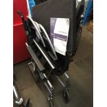 An Excel G3 lightweight folding wheelchair. Catalogue only, live bidding available via our