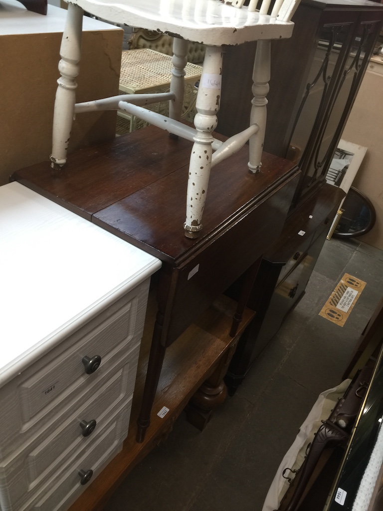 A mahogany drop leaf table, a white bedside cabinet and a white painted wheel back chair Catalogue