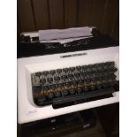 A vintage Olivetti Lettera 15 typewriter. Catalogue only, live bidding available via our website, if