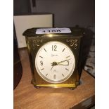 Small brass Swiza clock Catalogue only, live bidding available via our website, if you require P&P