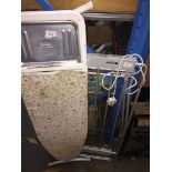 Ironing board and electric heated towel rail. Catalogue only, live bidding available via our