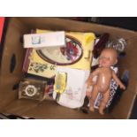 A box of misc to include knitting needles, doll, clock, etc. Catalogue only, live bidding