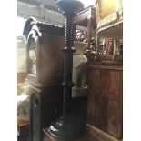 A reproduction twist pillar stand Catalogue only, live bidding available via our website, if you
