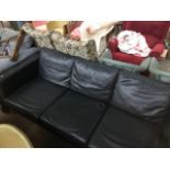 A black leather 3 seater sofa Catalogue only, live bidding available via our website, if you require