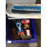 Blue plastic box of model vehicles and Titanic kit Catalogue only, live bidding available via our