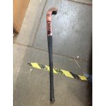 A hockey stick Catalogue only, live bidding available via our website, if you require P&P please