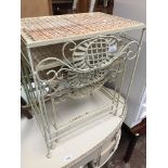 A wrought metal nest of three tables Catalogue only, live bidding available via our website, if