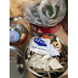 Three tins of haberdashery and sewing items.
