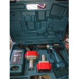A Makita cordless drill complete with charger and 2 batteries, in case. Catalogue only, live bidding