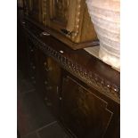 A mahogany bow front sideboard with gadrooned edge on claw and ball feet. Catalogue only, live