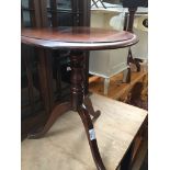 A small mahogany flip top tripod table Catalogue only, live bidding available via our website, if