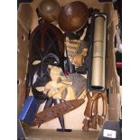 A box of wooden tribal items Catalogue only, live bidding available via our website, if you