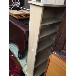 A small bookcase Catalogue only, live bidding available via our website, if you require P&P please