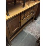 A light wood sideboard Catalogue only, live bidding available via our website, if you require P&P
