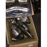 A box of stainless steel kitchen items. Catalogue only, live bidding available via our website, if