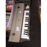 A Hohner Melodica piano 26 in original case. Catalogue only, live bidding available via our website,