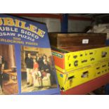 2 boxed Simpson Scalextric games, a jigsaw and a wooden box. Catalogue only, live bidding