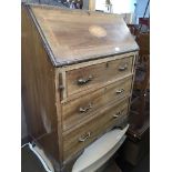 An Edwardian inlaid bureau Catalogue only, live bidding available via our website, if you require