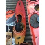 A Pyranha kayak with paddle. Catalogue only, live bidding available via our website, if you