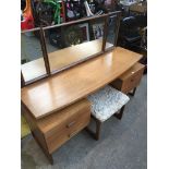 A G-Plan retro teak dressing table and stool Catalogue only, live bidding available via our website,