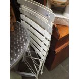 A pair of metal folding patio chairs Catalogue only, live bidding available via our website, if