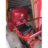 A Suffolk Punch petrol lawn mower Catalogue only, live bidding available via our website, if you