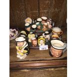 Collection of miniature Royal Doulton character jugs etc. Catalogue only, live bidding available via