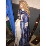 A large doll. Catalogue only, live bidding available via our website, if you require P&P please read