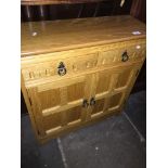A light oak side cabinet Catalogue only, live bidding available via our website, if you require P&