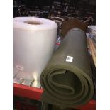 A yoga mat and a roll of vacuum bags Catalogue only, live bidding available via our website, if