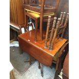 A Reprodux mahogany dining table and four chairs Catalogue only, live bidding available via our