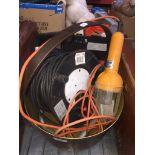 A large jam pan containing extension lead and inspection lamp. Catalogue only, live bidding