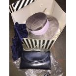 A ladies fashion hat in box. Catalogue only, live bidding available via our website, if you
