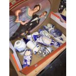A shoe box of Delft style porcelain and a Royal tin Catalogue only, live bidding available via our
