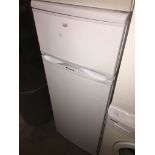A Hotpoint fridge freezer Catalogue only, live bidding available via our website, if you require P&P