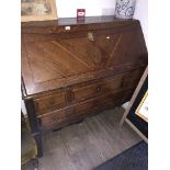 A 19th century oak cross banded and inlaid large bureau, height 116cm, width 125cm, depth 58cm.