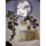 Magnifying glass on stand and a bag of coins etc. Catalogue only, live bidding available via our